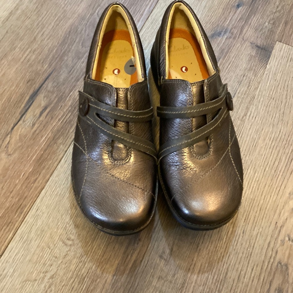 Clark’s artisan unstructured slip ons